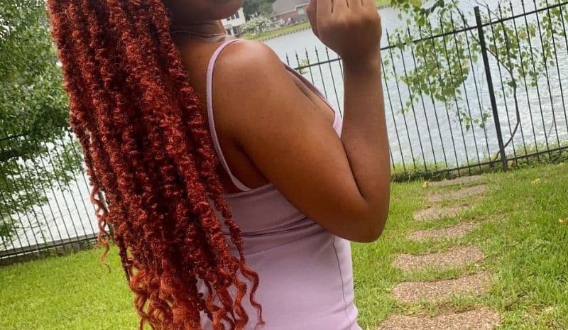 Woman with ZRQ Locs