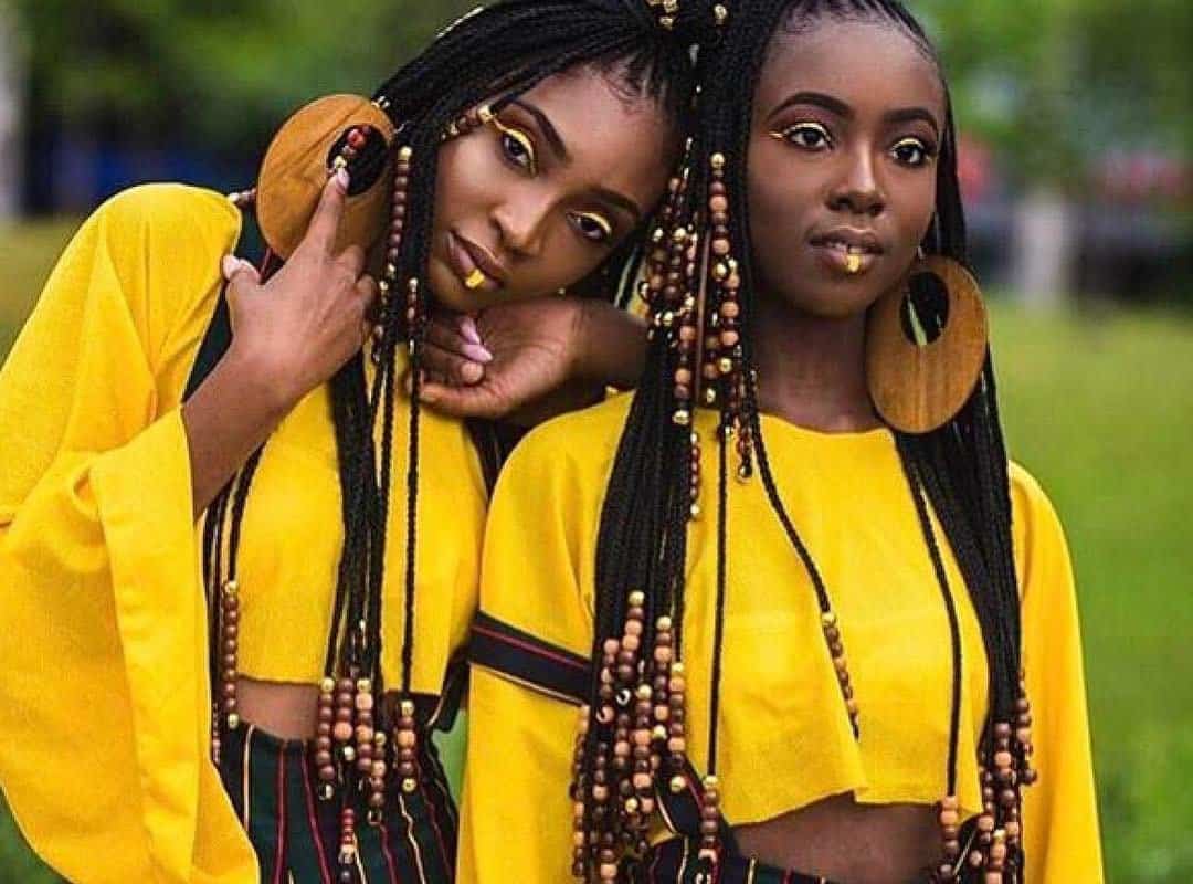 girls with black tribal braids with colored natural beads