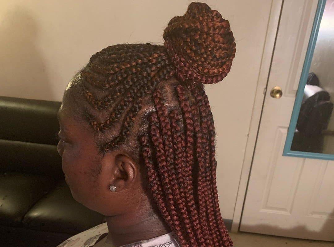 woman with brown top bun for tribal braids