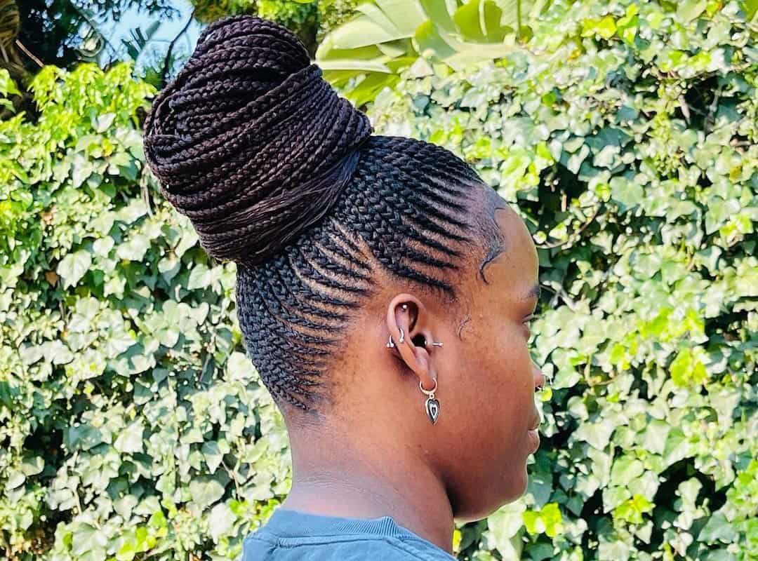girl with dark top bun for tribal braids