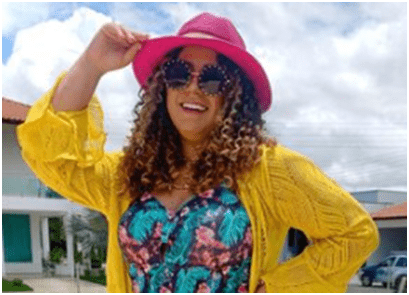 The Classic Loose Curls with Hat hairstyle
