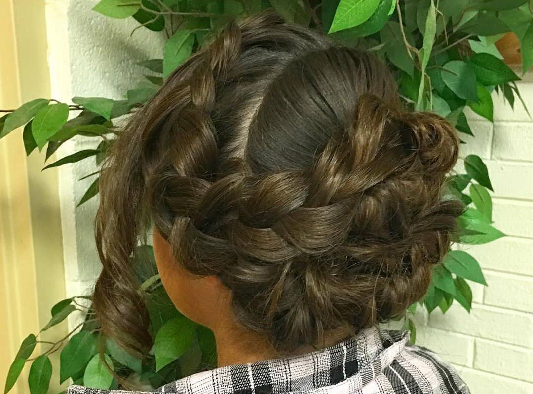 girl with a dark Dutch Braided updo