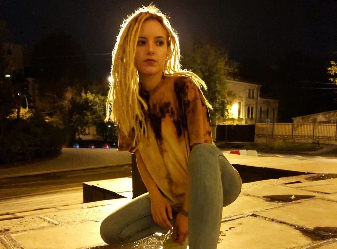 girl with blond hippie dreads