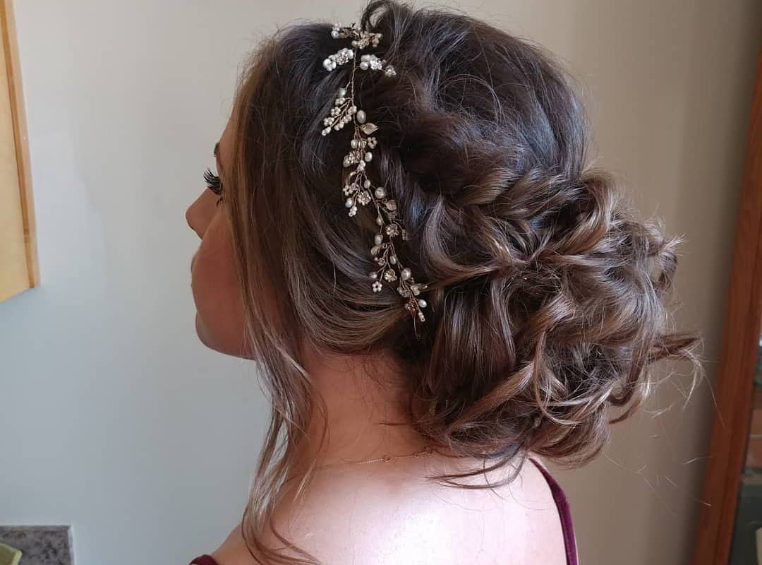 girl with a braided fishtail updo
