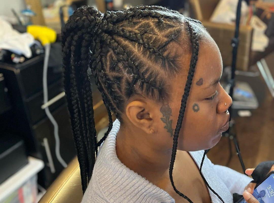 woman with brown knotless zig-zag braids 