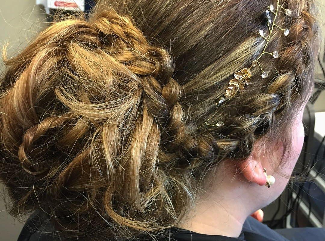 girl with a messy braided bun