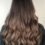 Brown balayage with shiny light brown tips