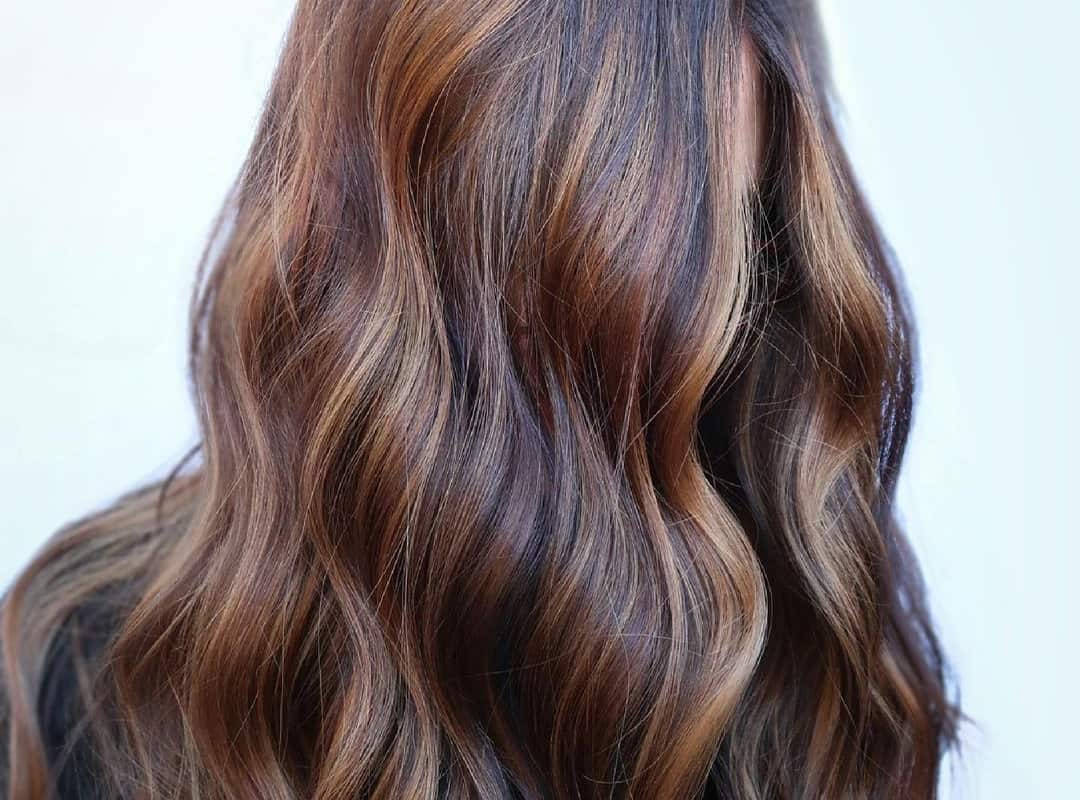 dark butterscotch balayage with caramel highlights