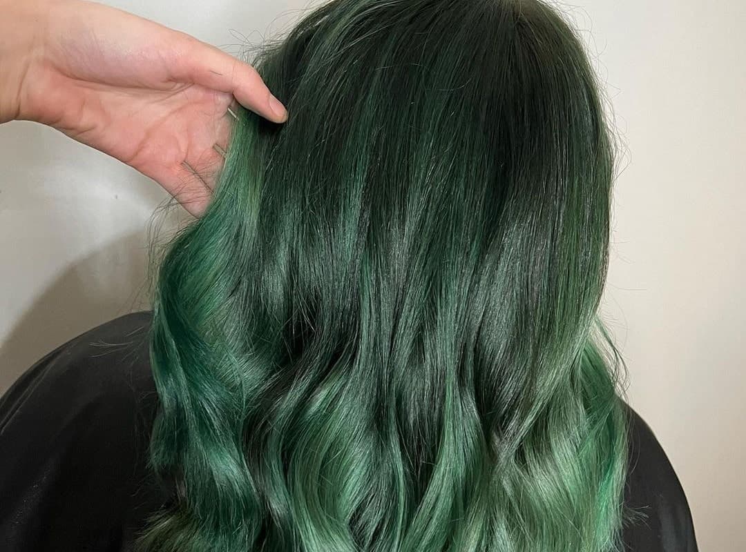 green balayage with black roots