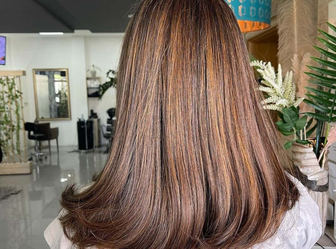 butterscotch caramel balayage on straight hair