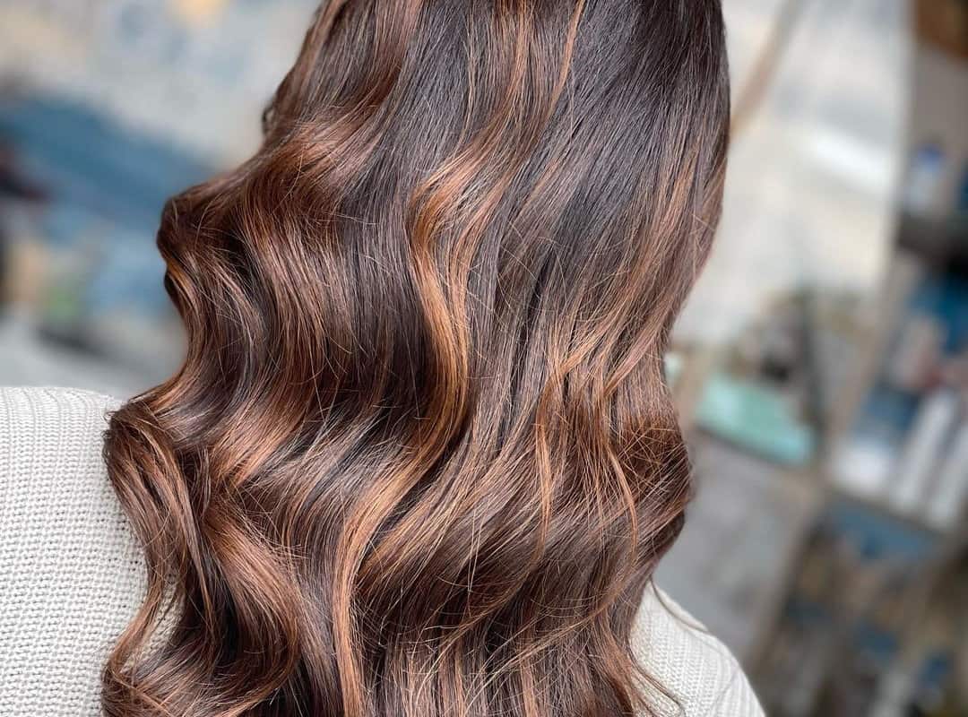 cinnamon butterscotch caramel balayage on long hair