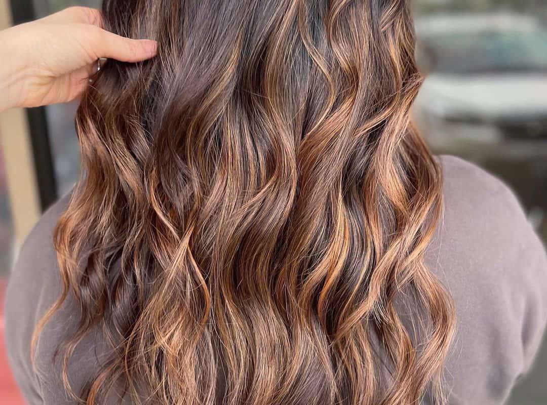 brown hair with cinnamon butterscotch balayage
