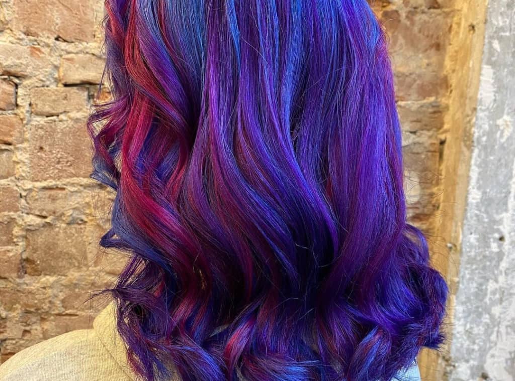Mermaid galaxy on short hair with red highlights