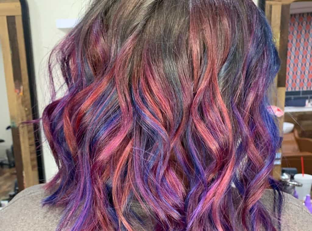 sunset mermaid hair with blonde roots