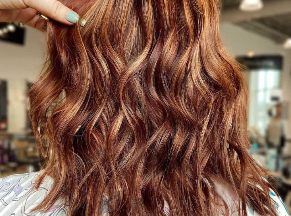 Hair with Warm butterscotch caramel balayage