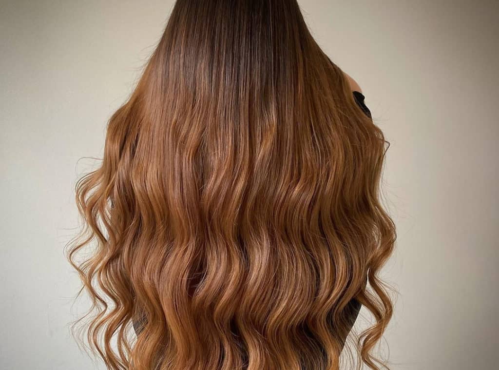Warm butterscotch caramel balayage on hair