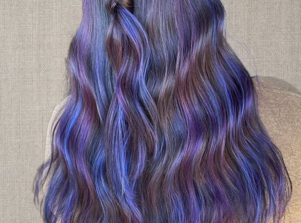pastel galaxy balayage on brown long waves