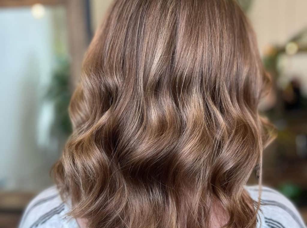 Light butterscotch caramel balayage on hair