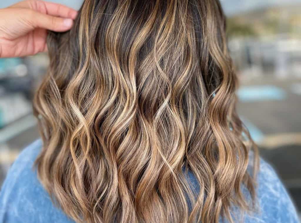 Brunette with butterscotch caramel balayage