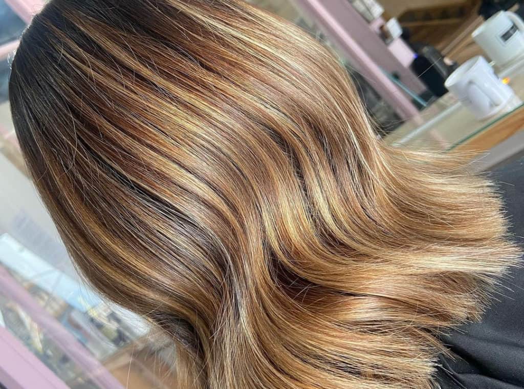 Light butterscotch caramel balayage hairstyle on hair