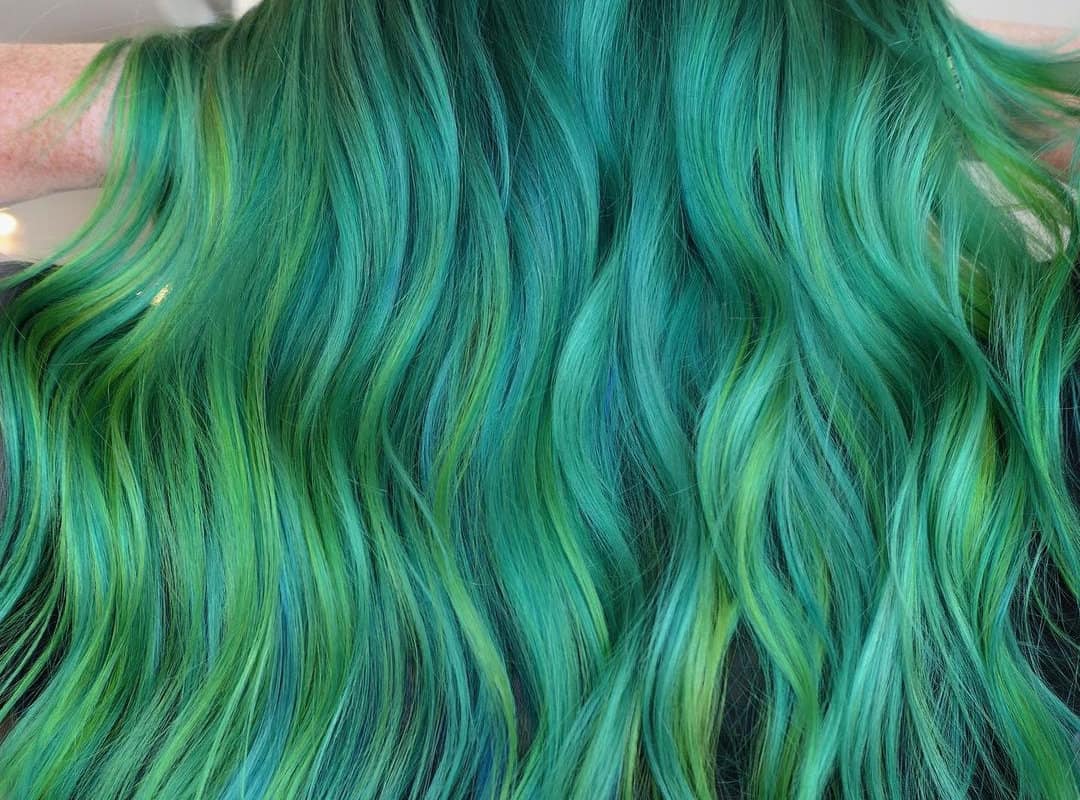 light blue waves with green highlights