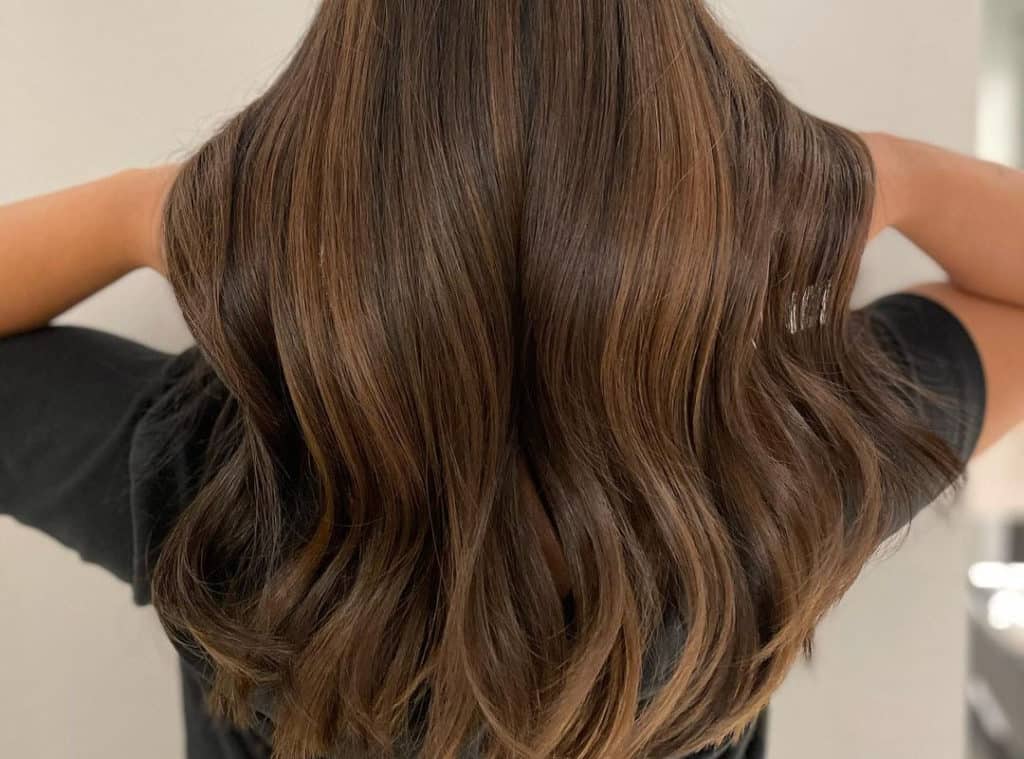 Caramel balayage hairstyle for Asian hair