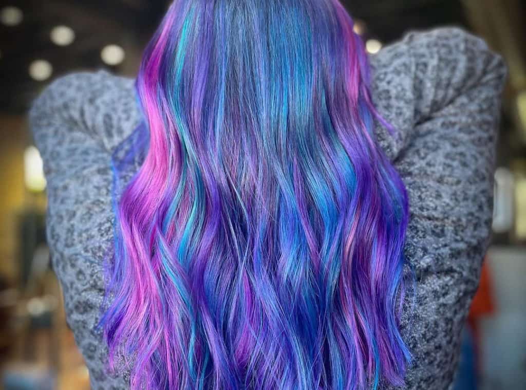 unicorn balayage with pink, blue, green highlights