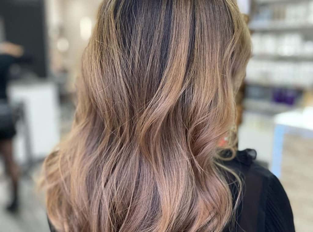 honey balayage on dark brown hair