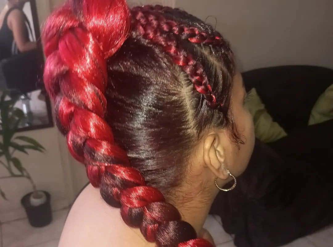 girl with a red braided ponytail