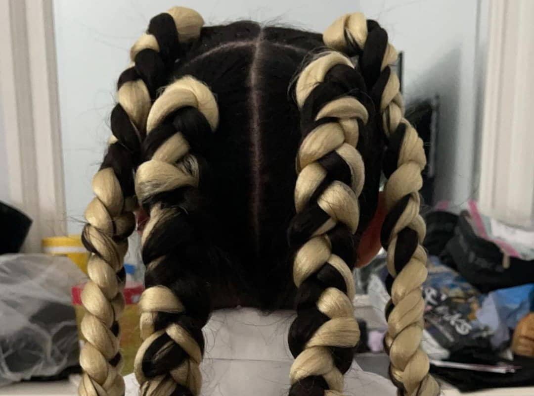 girl with black and blonde 4-jumbo braids