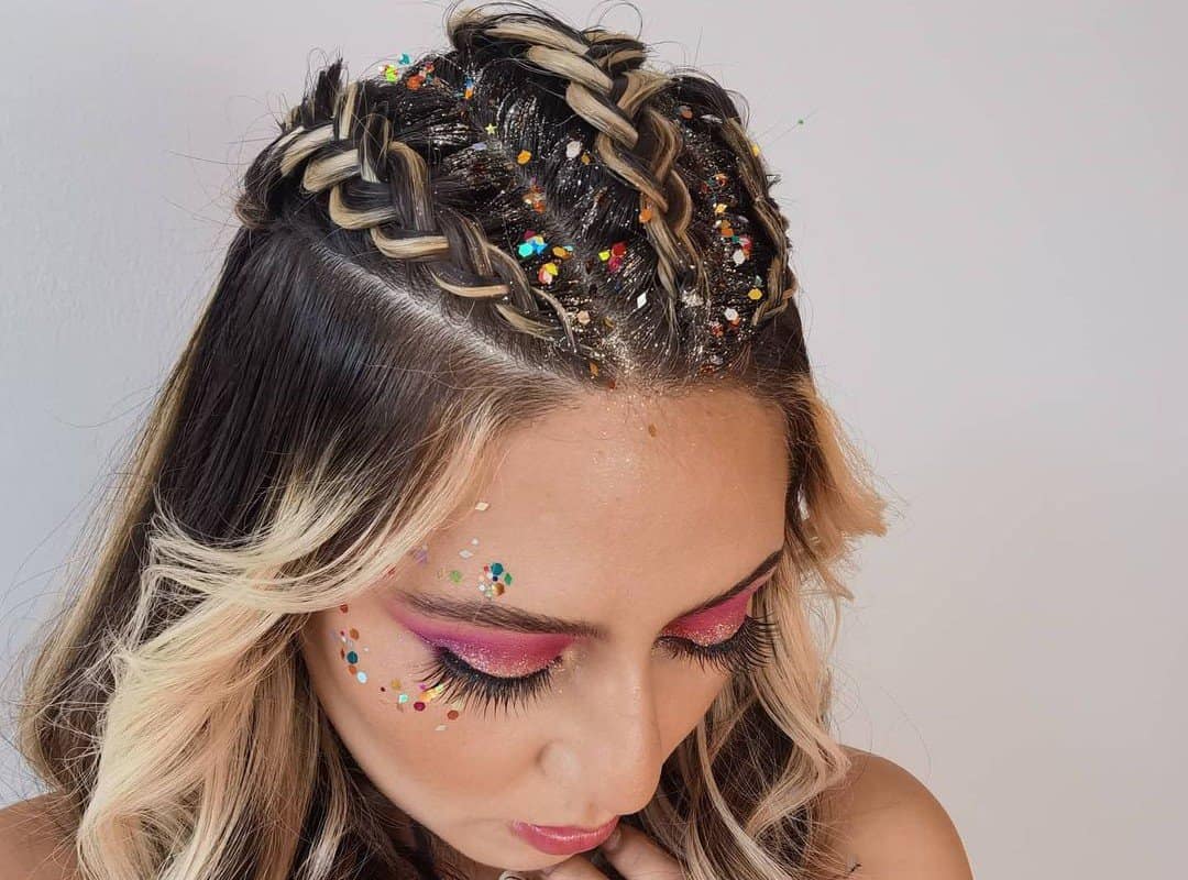 girl with black and blonde glitter rave hairstyle