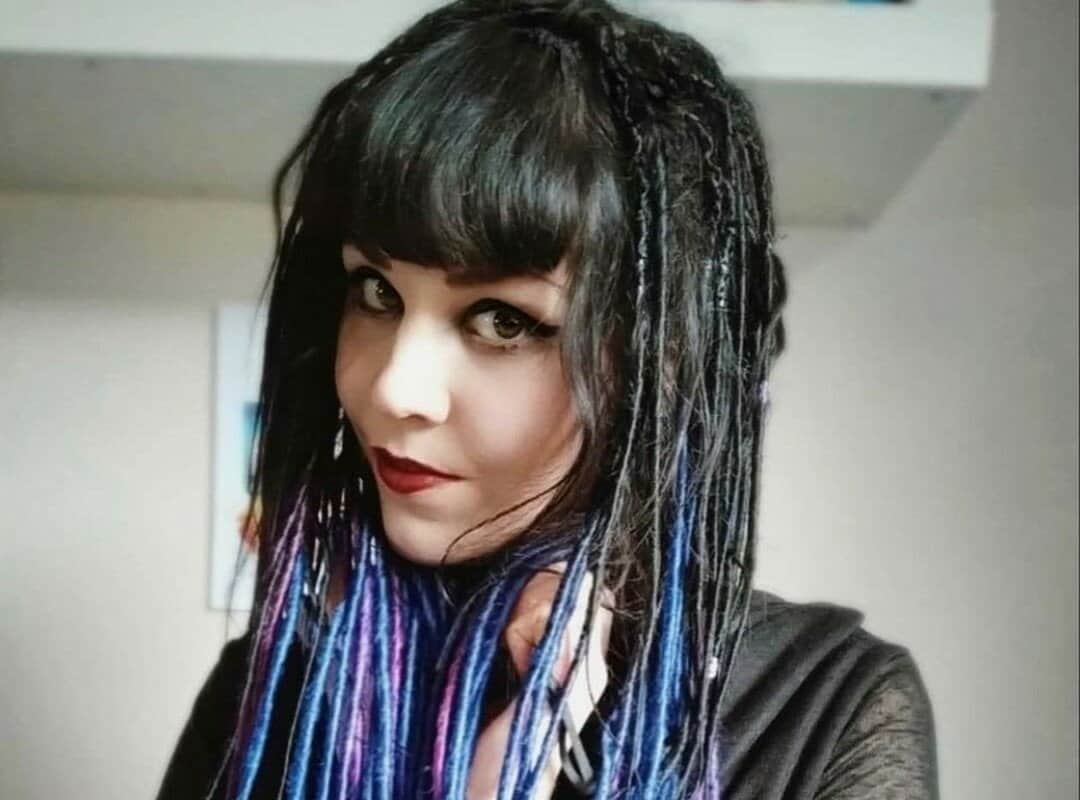 girl with black and blue gradient dyed dreads