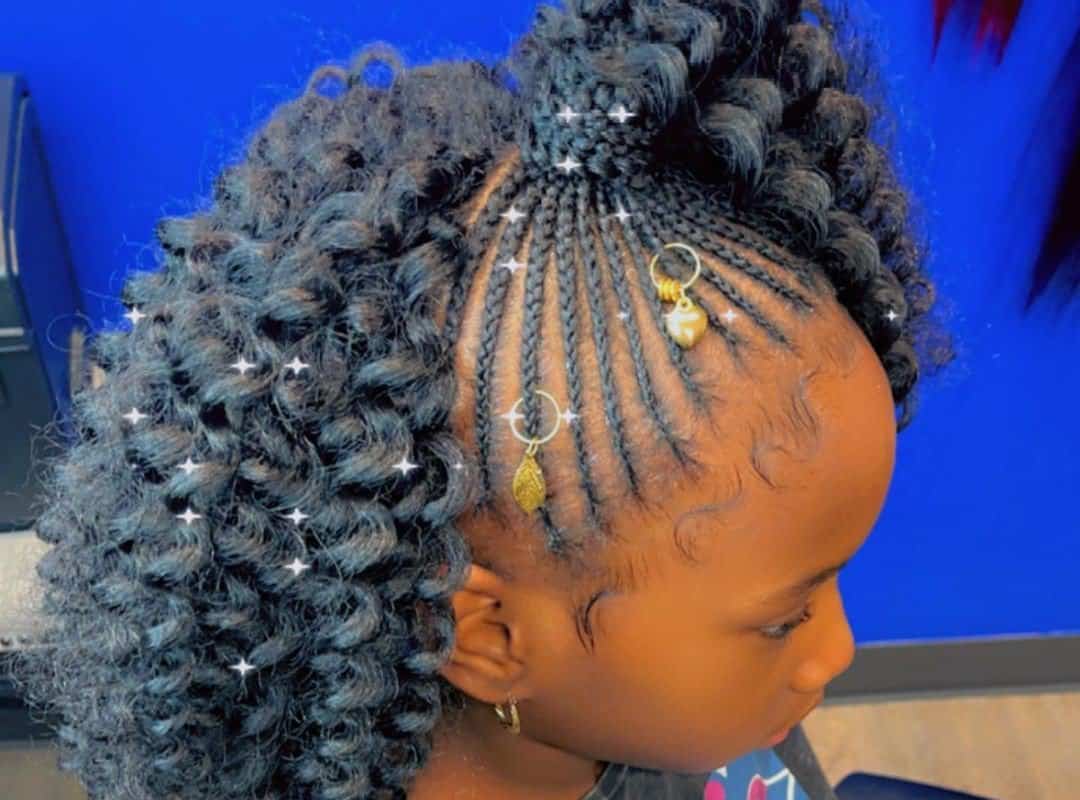 girl with black cheer half up, half down hairstyle