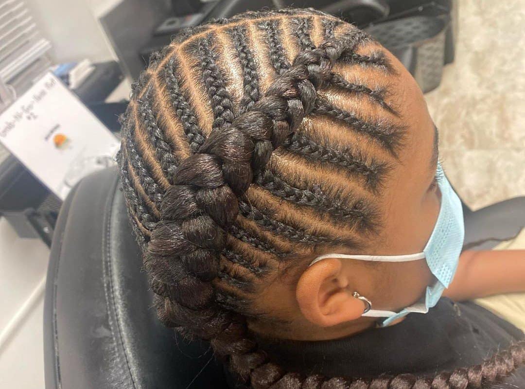 girl with a black cheer side braid