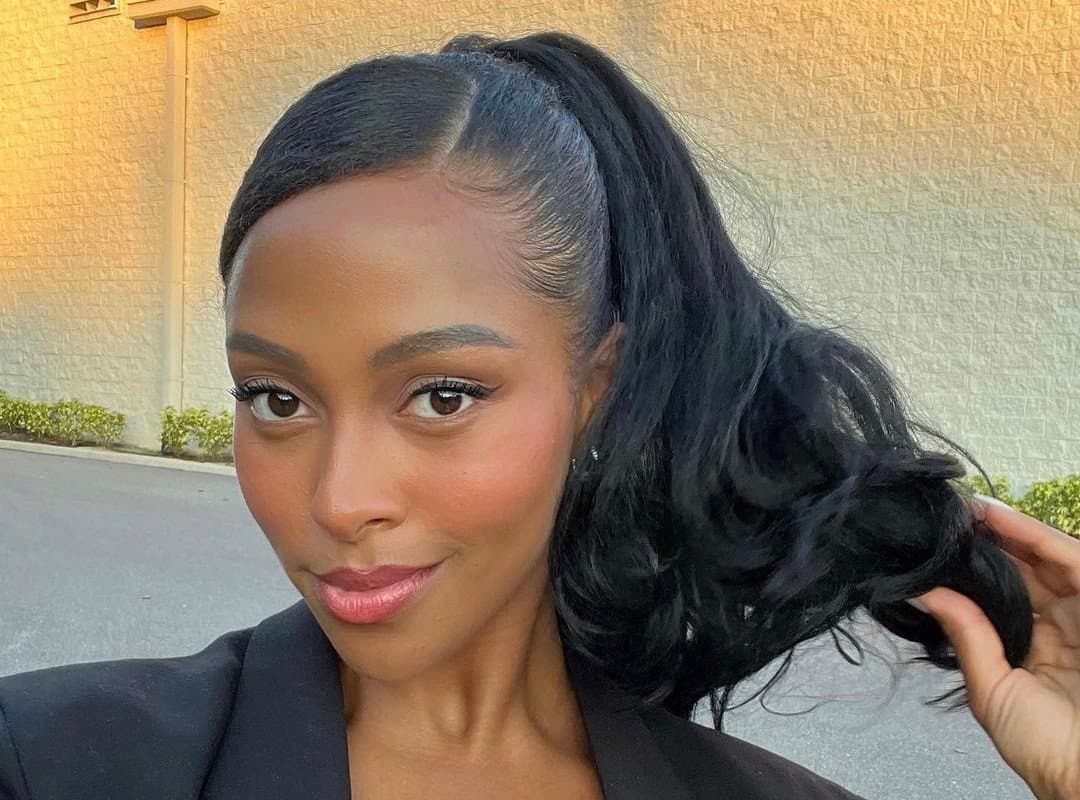 girl with black curly ponytail hairstyle