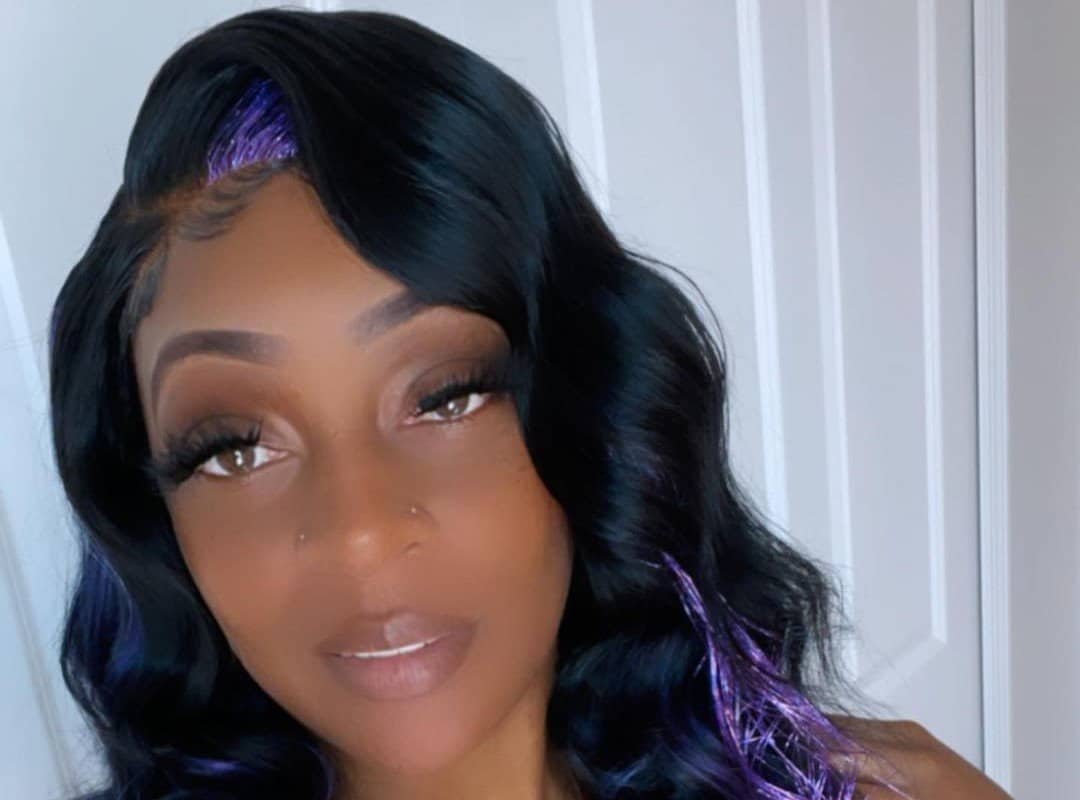 girl with black and purple glitter rave hairstyle