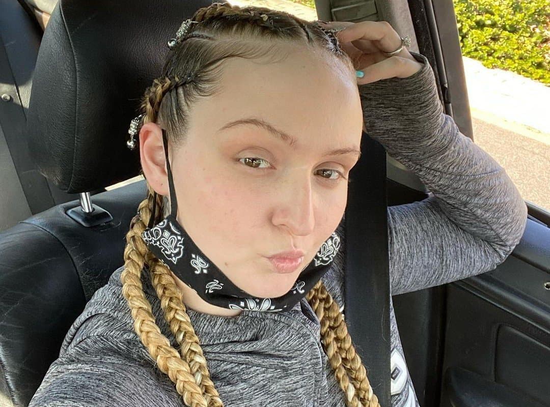 girl with blonde 4-french braids
