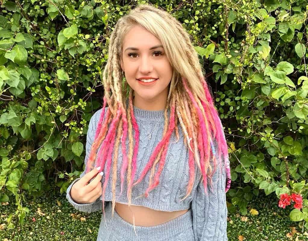 girl with blonde and pink ombre dyed dreads