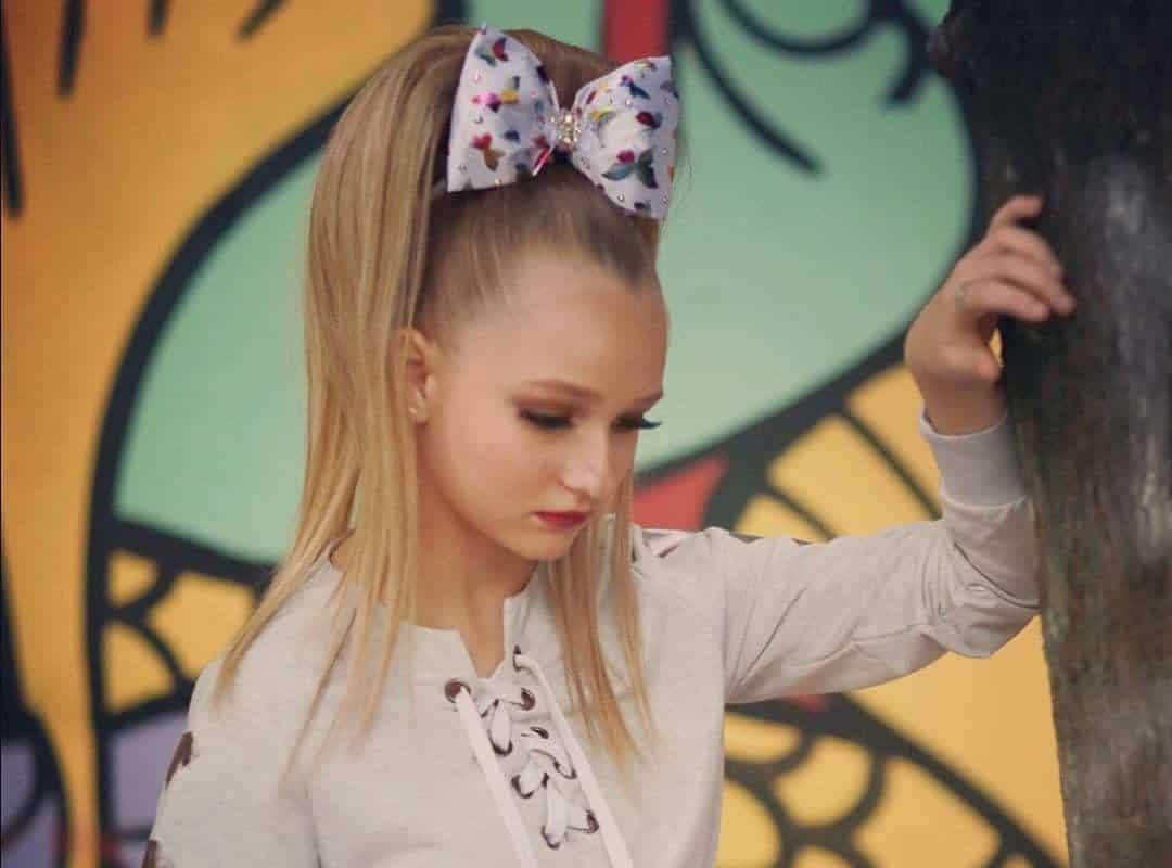 girl with a cheer blonde ponytail