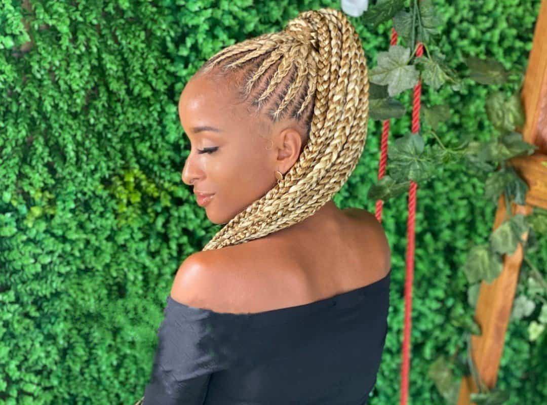 girl with blonde high braided ponytail