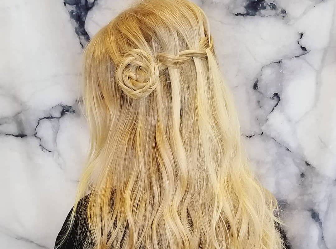 girl with blonde waterfall braid