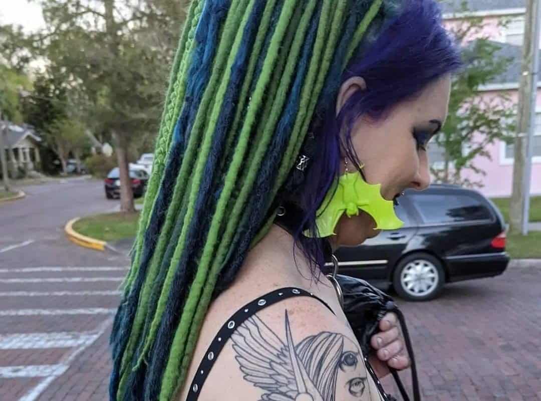 girl with blue and green dyed dreads