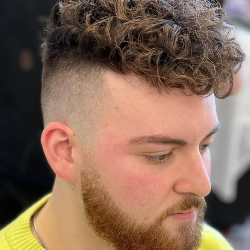 A man with a broccoli haircut