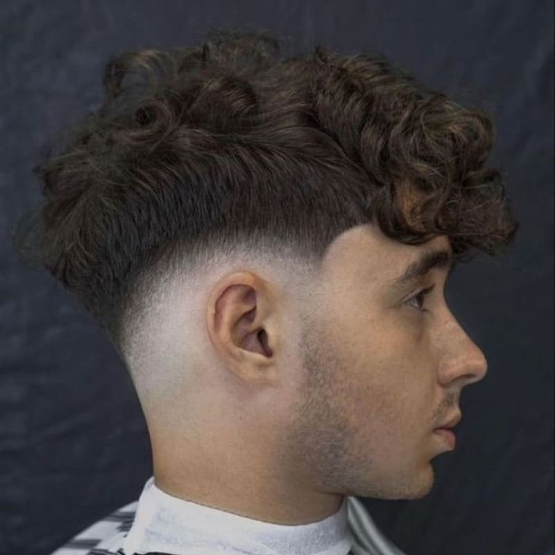 A man with a broccoli haircut