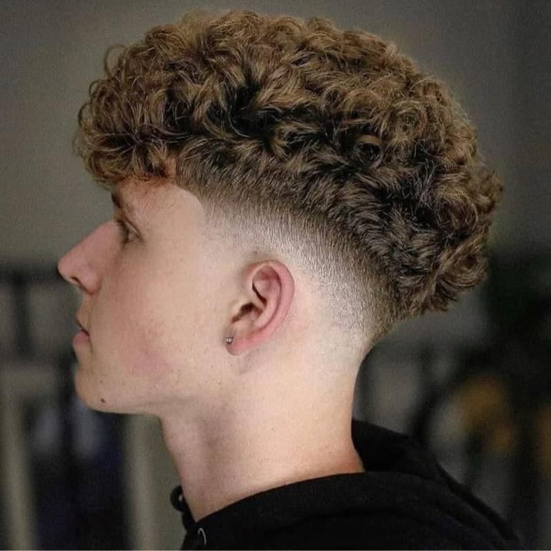 A man with a broccoli haircut