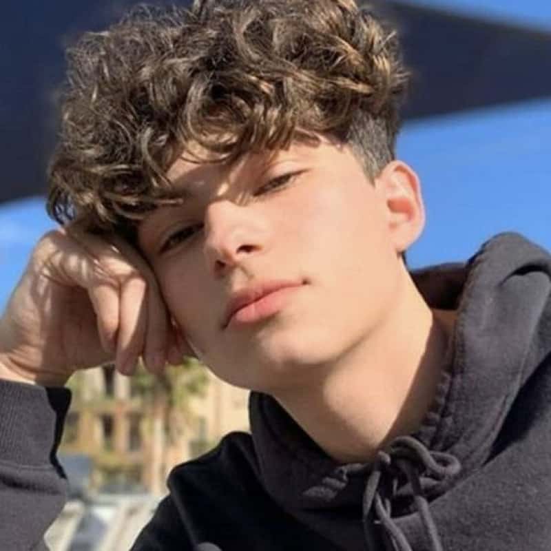 A man with a broccoli haircut