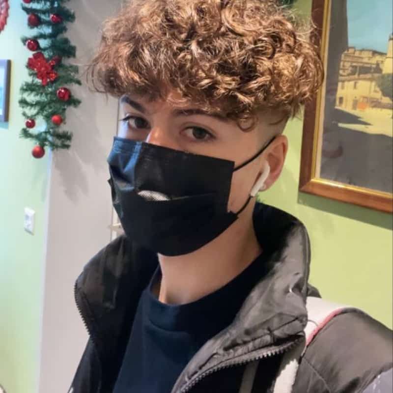 A man with a broccoli haircut