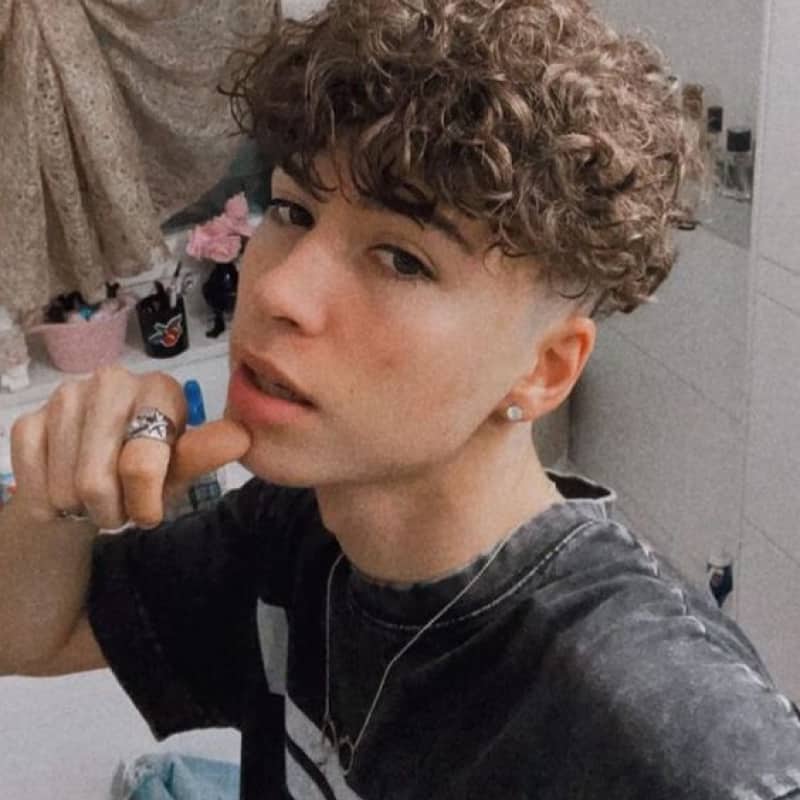 A man with a broccoli haircut