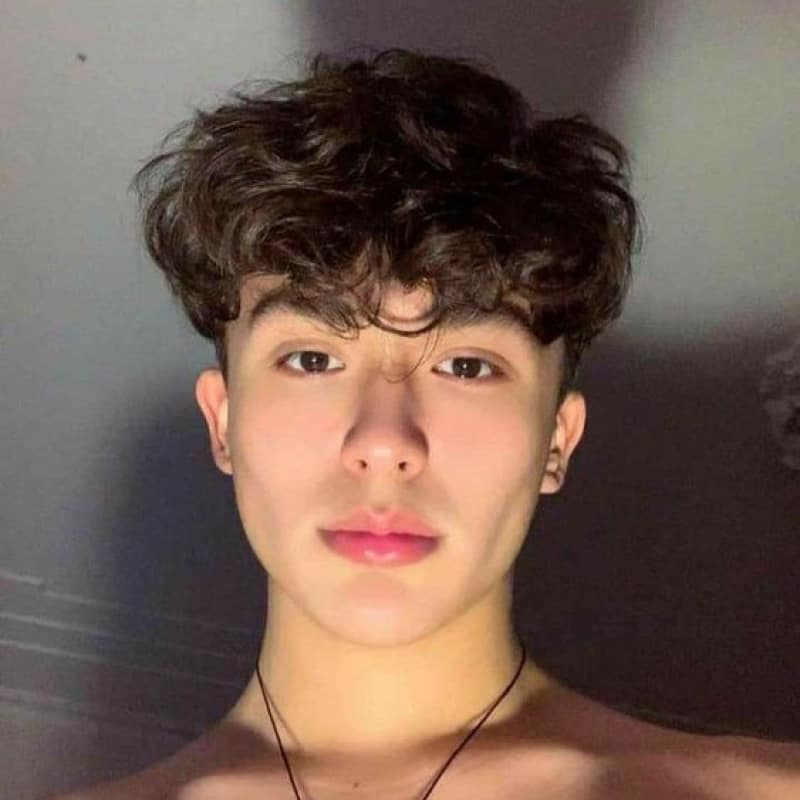 A man with a broccoli haircut