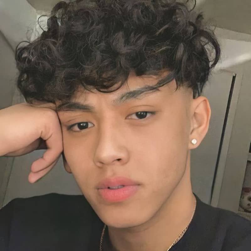 A man with a broccoli haircut